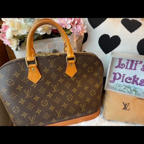 Pre love Alma LV, a sign of watermark, and burn. - Picture 7 of 16